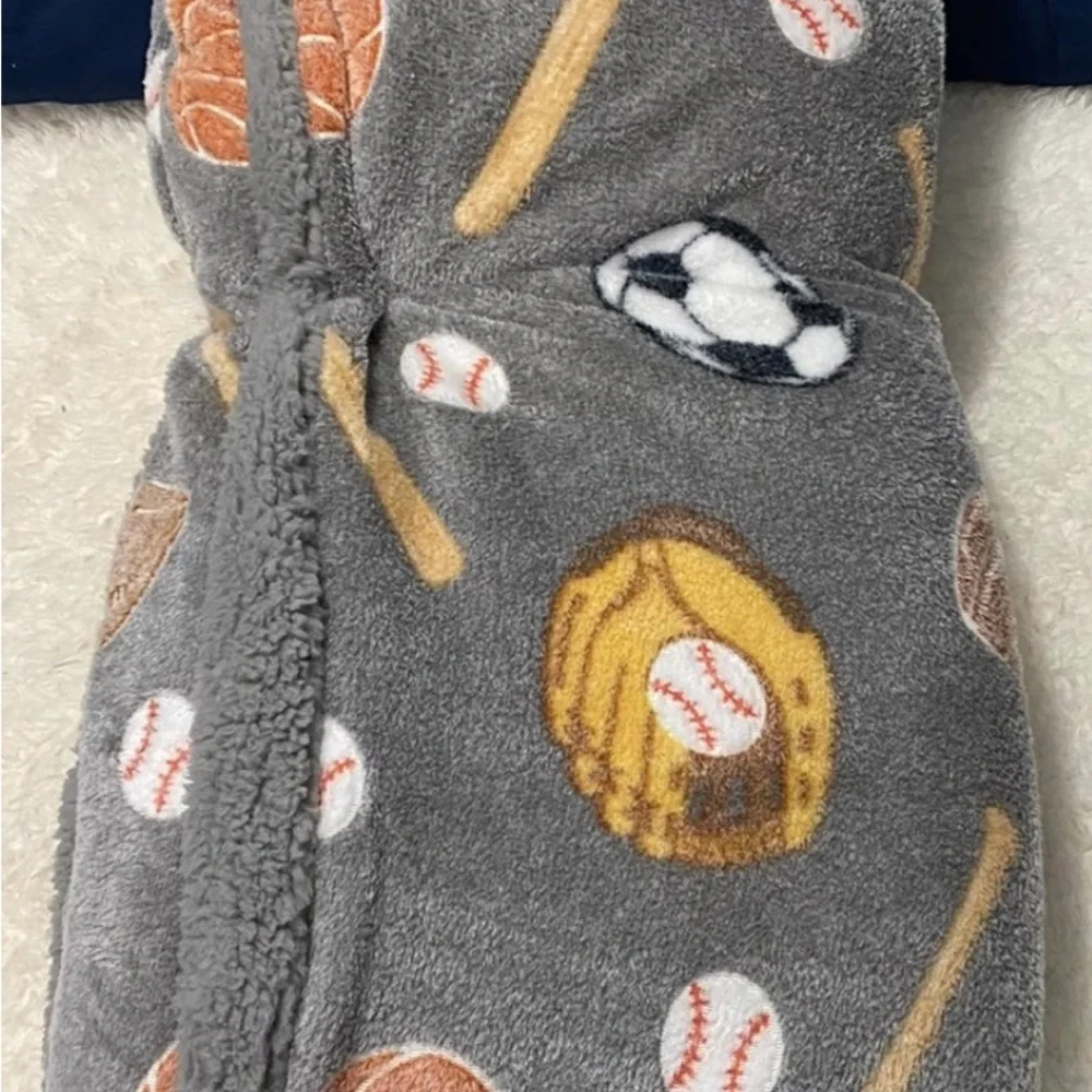 Gray Sports Glow in the Dark Reversible Sherpa Throw.